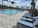 Resort-style pool with plenty of lounge chairs at 14827 Milfoil Ave, Orlando, FL 32827
