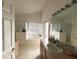 Main bathroom with a garden tub, shower, and double vanity at 2511 La Jolla Trl, Kissimmee, FL 34747