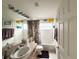 Bathroom with a shower/tub combo and updated vanity at 2511 La Jolla Trl, Kissimmee, FL 34747