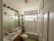 Clean bathroom with tub, shower, and vanity at 2511 La Jolla Trl, Kissimmee, FL 34747
