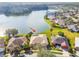 Aerial view highlighting lakefront location at 256 New River Dr, Poinciana, FL 34759