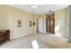 Spacious bedroom features neutral walls, carpet floors, and a large walk-in closet at 256 New River Dr, Poinciana, FL 34759