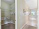 Open walk-in closet with ample storage shelving for organizing personal belongings at 256 New River Dr, Poinciana, FL 34759