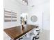 Bright dining room with a wooden table and white chairs at 269 Beckenham Dr, Kissimmee, FL 34758