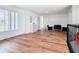 Spacious hallway with hardwood floors and access to other rooms at 269 Beckenham Dr, Kissimmee, FL 34758