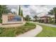 Attractive Solterra Resort entrance sign with lush landscaping and guard house at 4626 Terrasonesta Dr, Davenport, FL 33837