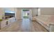 Bright living room with modern furniture and a view to the backyard at 19041 Blueleaf St, Orlando, FL 32827