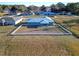 House with fenced backyard, located in residential neighborhood at 25 Juniper Loop Cir, Ocala, FL 34480