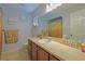 Clean bathroom with a vanity and gold accents at 25 Juniper Loop Cir, Ocala, FL 34480