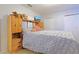 Guest bedroom with a wooden headboard and closet at 25 Juniper Loop Cir, Ocala, FL 34480