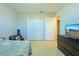 Bedroom with twin bed, closet, and TV at 25 Juniper Loop Cir, Ocala, FL 34480
