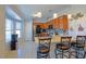 Eat-in kitchen with breakfast bar and stainless steel appliances at 25 Juniper Loop Cir, Ocala, FL 34480