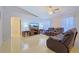 Bright living room featuring leather seating and a large TV at 25 Juniper Loop Cir, Ocala, FL 34480