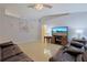 Open living area with comfortable leather sofas and wall art at 25 Juniper Loop Cir, Ocala, FL 34480
