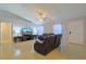 Living room with recessed lighting, tile floors, and leather furniture at 25 Juniper Loop Cir, Ocala, FL 34480