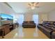 Spacious living room with leather recliners and large TV at 25 Juniper Loop Cir, Ocala, FL 34480