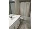 Bathroom with white vanity, tub, and shower at 2986 Aqua Virgo Loop, Orlando, FL 32837