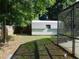 The backyard features a storage shed, a privacy fence, and some green space at 436 Michigan Ave, St Cloud, FL 34769
