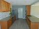 Well-lit kitchen boasts granite countertops and stainless steel appliances at 436 Michigan Ave, St Cloud, FL 34769