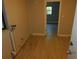 View of a room featuring tile floors and an open doorway to another room with a window at 436 Michigan Ave, St Cloud, FL 34769