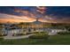 Resort-style pool and clubhouse at sunset at 5043 Vantage Ct, St Cloud, FL 34772