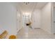 Spacious hallway with tile flooring, and neutral walls at 1242 Iguana Loop, Davenport, FL 33897