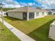 Single-Gathering home with screened-in patio at 1242 Iguana Loop, Davenport, FL 33897