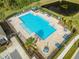 Aerial view of community pool and surrounding area at 1242 Iguana Loop, Davenport, FL 33897