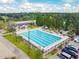 Aerial view of the large community pool with ample seating and parking at 1280 Osprey Landing Dr, Lakeland, FL 33813