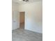 Simple bedroom with tile floors and a ceiling fan at 1810 Dunbar St, Bartow, FL 33830