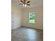Bright bedroom with tile flooring and a ceiling fan at 1810 Dunbar St, Bartow, FL 33830
