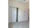 Bedroom with tile floors, closet, and neutral wall color at 1810 Dunbar St, Bartow, FL 33830