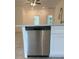 Modern kitchen with stainless steel dishwasher and white cabinets at 1810 Dunbar St, Bartow, FL 33830