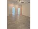 Spacious living room featuring tile floors and access to other rooms at 1810 Dunbar St, Bartow, FL 33830