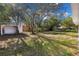 Spacious backyard with shed and mature trees at 1812 Corolla Ct, Deltona, FL 32738