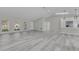 Open floor plan living room with high ceilings and kitchen at 1812 Corolla Ct, Deltona, FL 32738