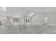 Open floor plan living room with high ceilings and kitchen at 1812 Corolla Ct, Deltona, FL 32738