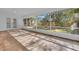 Bright screened porch overlooking the backyard at 1812 Corolla Ct, Deltona, FL 32738