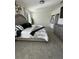 Comfortable main bedroom with a plush bed, soft carpeting, and decorative accents for a serene ambiance at 2459 Taloncrest Ct, Eagle Lake, FL 33839