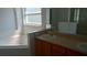 Bright bathroom with a tub and a double sink vanity at 2645 Oneida Loop, Kissimmee, FL 34747