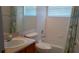 Bathroom with a tub and shower combination and single sink vanity at 2645 Oneida Loop, Kissimmee, FL 34747