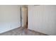 Bedroom with tan carpet and a closet at 2645 Oneida Loop, Kissimmee, FL 34747