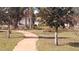 Curving community pathway, well-maintained landscaping at 2645 Oneida Loop, Kissimmee, FL 34747