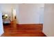 Spacious living room featuring laminate flooring with a view of other rooms in the house at 2645 Oneida Loop, Kissimmee, FL 34747