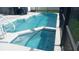 Inviting pool and spa area within a screened enclosure, ready for summer enjoyment at 2645 Oneida Loop, Kissimmee, FL 34747
