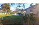Backyard with a patio, grill, and chickens at 2831 Rodeo Dr, Kissimmee, FL 34746