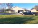 Home with attached garage and driveway at 2831 Rodeo Dr, Kissimmee, FL 34746