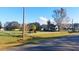 Vacant lot with a grassy area and white fence at 2831 Rodeo Dr, Kissimmee, FL 34746