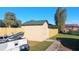 New storage shed with green metal roof at 2831 Rodeo Dr, Kissimmee, FL 34746