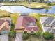 Housetop view showcasing a house with red roof and pool at 304 Sorrento Road, Poinciana, FL 34759